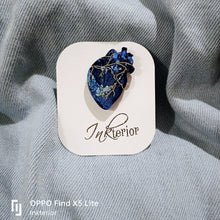 Blue heart pin badge